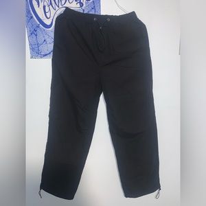 Black parachute pants